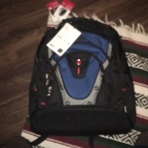 A Swiss backpack new with tags $ 100  here $70